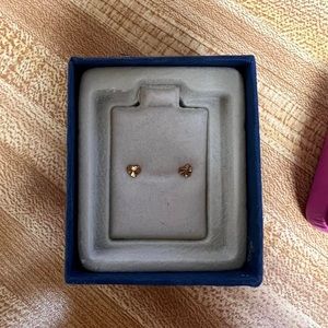 Gold, heart earrings.